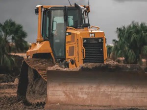 Caterpillar dozer at construction job site